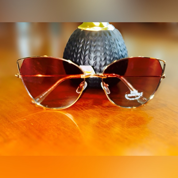 Accessories - Adorable cat eye sunglasses with gold tone rim and rose lenses. NWT